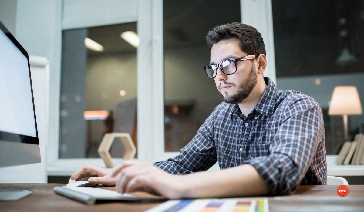 Professional Web Designer working in front of computer